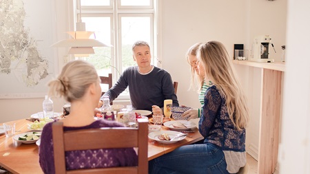 Family at dinner table